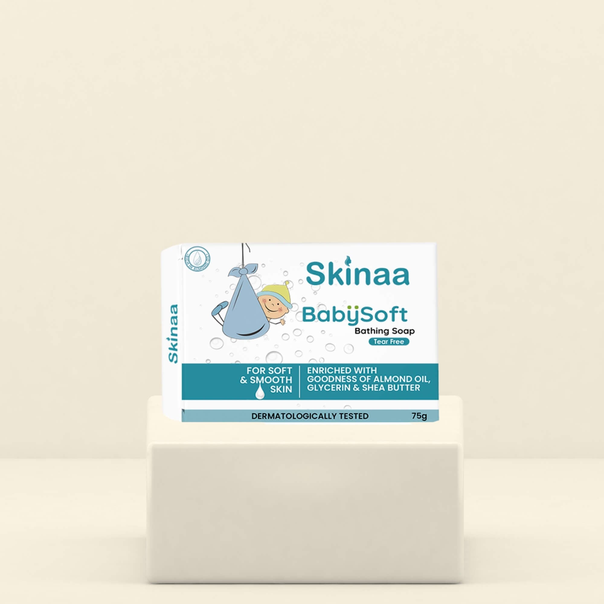 Skinaa BabySoft Bathing Soap pack placed on a white pedestal, designed for babies with almond oil, glycerin, and shea butter for soft and smooth skin.